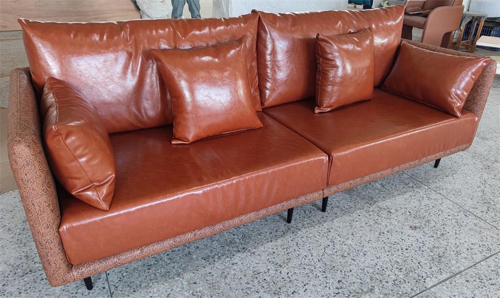 Elegant high-end leather club sofa with embossed side panels, perfect for upscale clubs, bars, and restaurants.