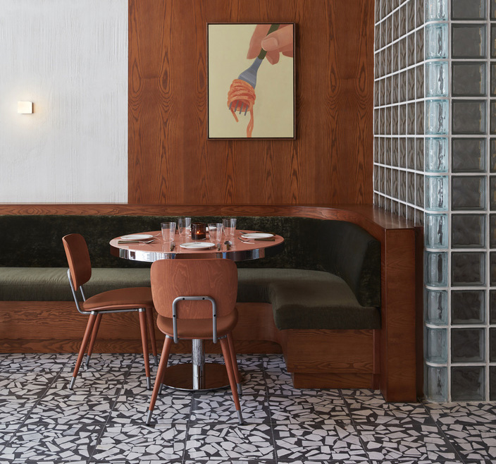 Modern restaurant booth designs with minimalist aesthetics in a contemporary dining space