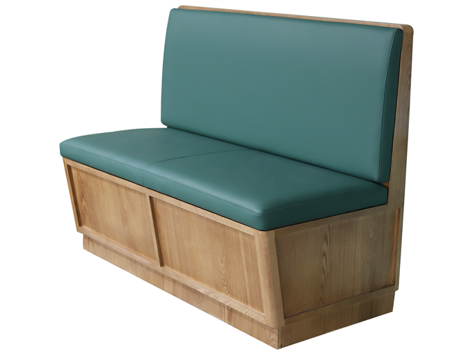 Modern restaurant booth seat with green leather upholstery and a solid wooden frame