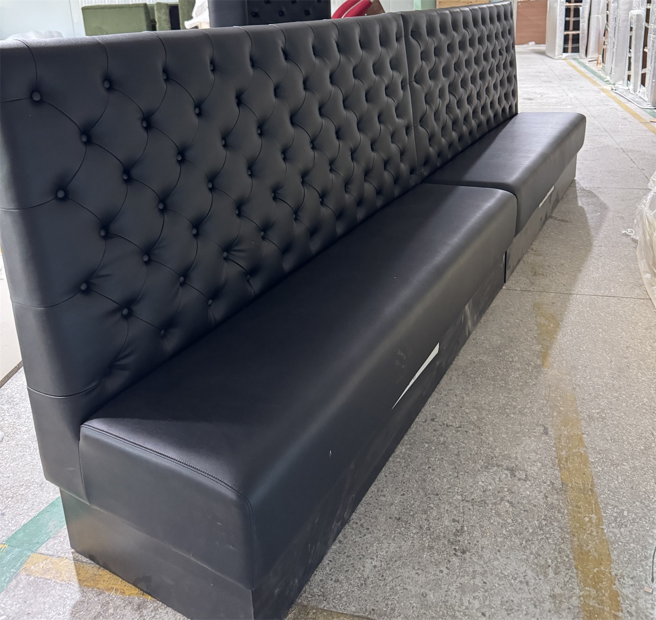 button-tufted restaurant booth