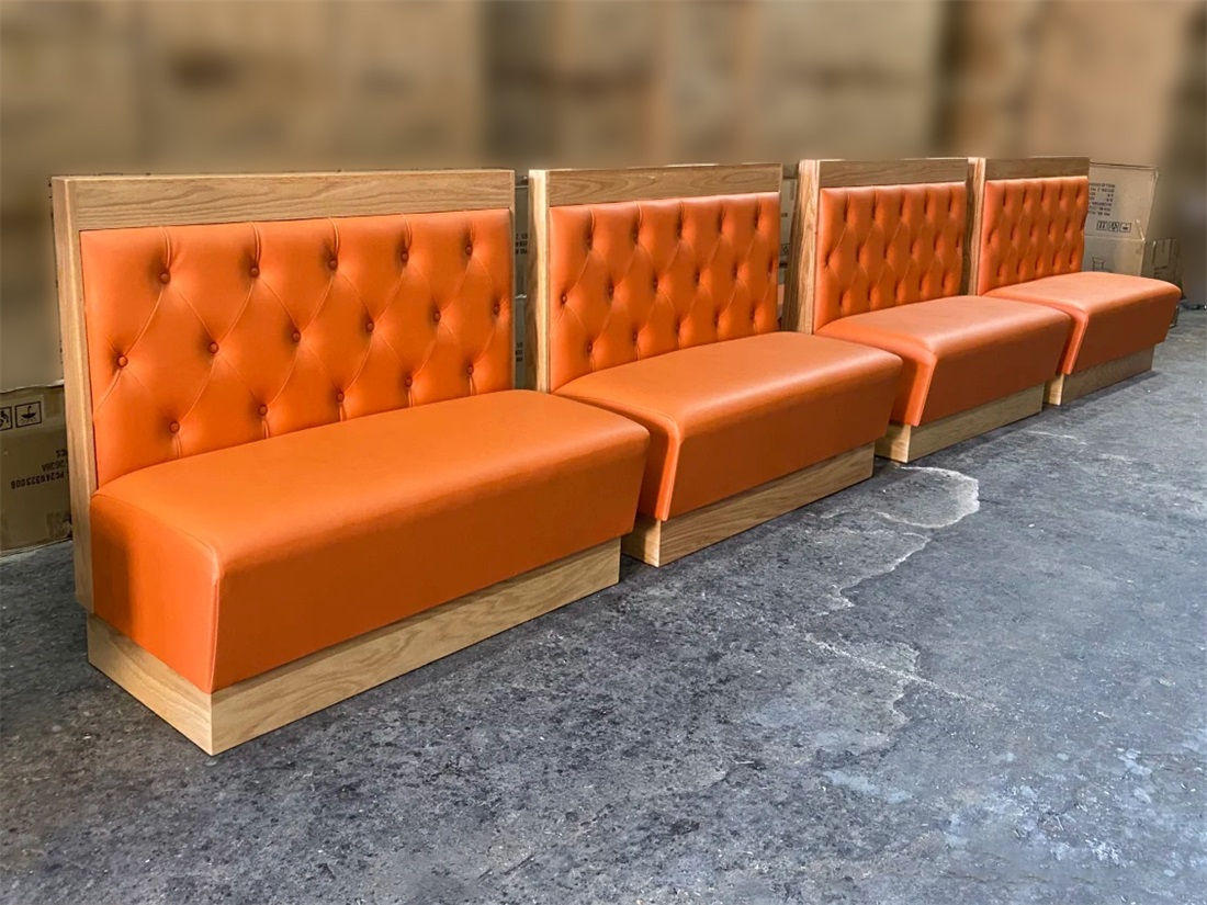 Modern Upholstered Restaurant Booth Seating – Orange Vinyl with Wooden Base for Cafes & Coffee Shops
