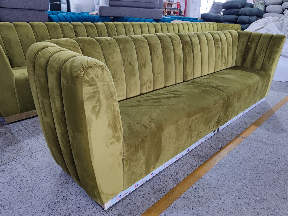 Plush upholstered modular sofa in soft velvet fabric