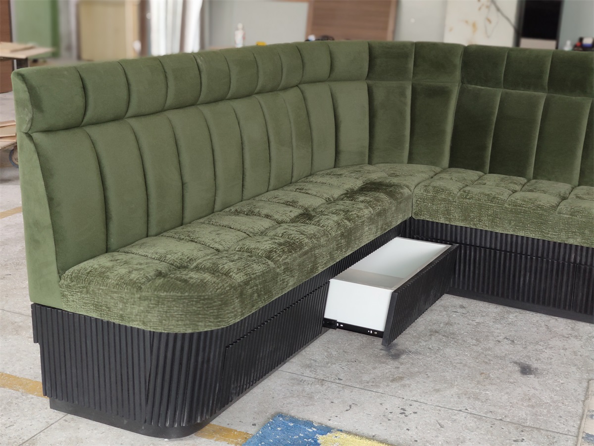 Customizable L-shaped booth seating with plush velvet upholstery, ideal for dining spaces and lounges.